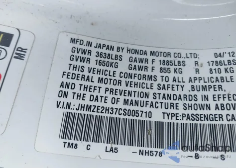 2012 Honda Insight from USA, damaged, VIN JHMZE2H37CS005710